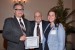 Dr. Nagib Callaos, General Chair, giving Dr. Ronald A. Styron, Jr. and Dr. Jennifer Styron the best paper award certificate of the session "Educational Research, Theories, Practice and Methodologies." The title of the awarded paper is "Directing a Quality Enhancement Plan."